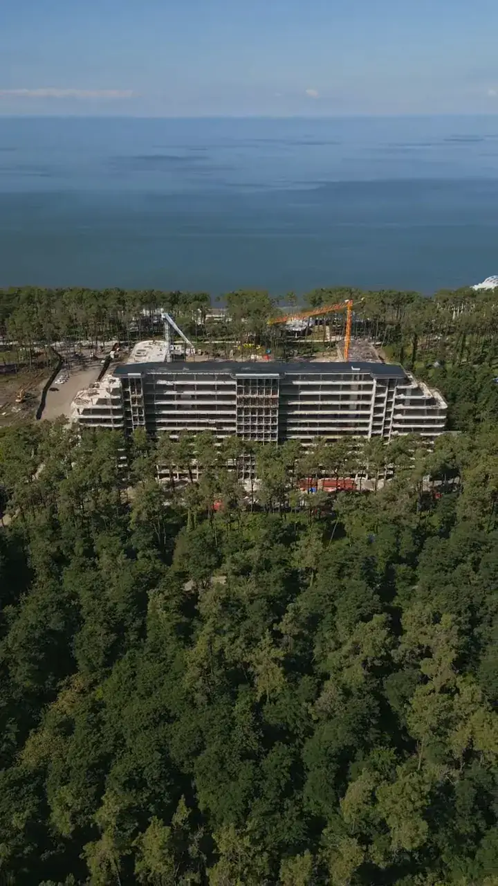 Block A in the pine forest, the sea behind it